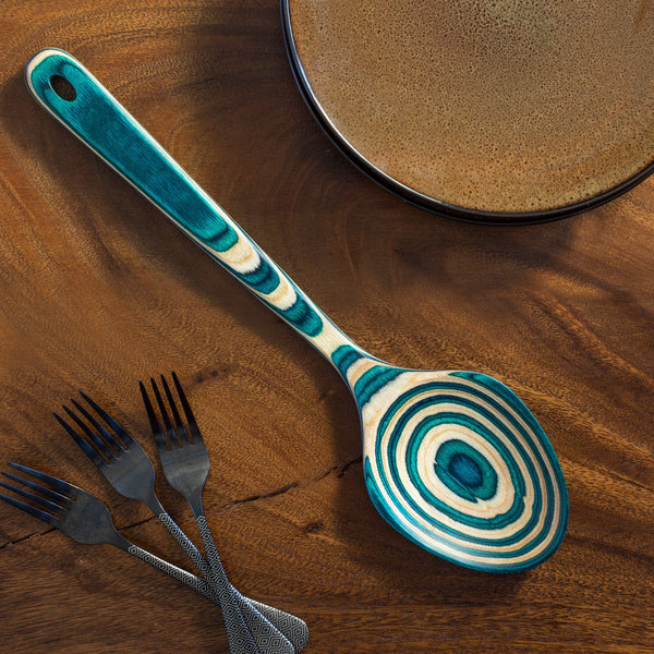 http://totallybamboo.com/cdn/shop/products/20-9540MykonosGrandServingSpoon_Wood_grande.jpg?v=1658784539