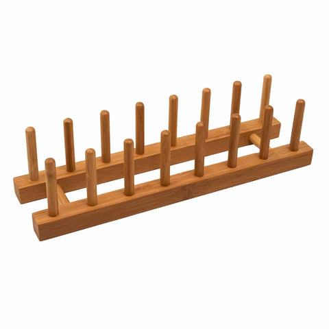 The Totally Bamboo 7-Slot Bamboo Rack, crafted from natural-colored wood, includes two rows of vertical dowels designed to hold plates, lids, or cutting boards upright. This minimalist drying rack perfectly balances simplicity and functionality.