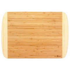 The Totally Bamboo Kona Groove Carving Board, measuring 18" x 12-1/2", is a rectangular bamboo cutting board with a smooth surface and rounded edges. Its light brown wood grain forms a natural pattern, making it perfect for kitchen prep.