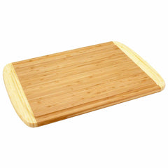 The Kona Groove Carving Board by Totally Bamboo features a rectangular bamboo design with rounded edges and a two-tone look, making it perfect for kitchen prep. Its light brown surface reveals natural wood grain patterns, capturing the essence of this carving board as it rests flat against a white background.