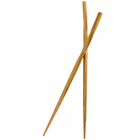 A pair of Totally Bamboo's "Twist" reusable bamboo chopsticks crossed against a white background.