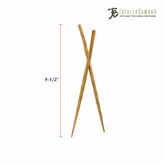 Two handcrafted "Twist" reusable bamboo chopsticks form a cross at the top, featuring the "Totally Bamboo" logo elegantly placed in the upper right corner. A measurement line on the left indicates their length of 9-1/2 inches. These beautifully crafted chopsticks are set against a pristine white background.