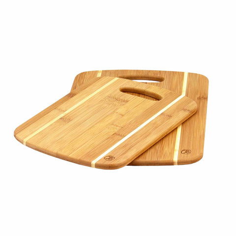 The 2-Piece Striped Bamboo Cutting Board Set by Totally Bamboo features two cutting boards with handles, expertly displaying light wood grain and white stripe details. These boards are slightly offset against a white background, making them ideal as sophisticated kitchen accessories.