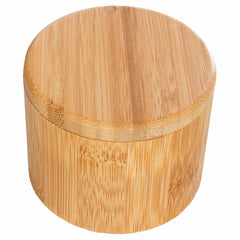 Introducing the Totally Bamboo Salt Cellar with Swivel Lid, featuring a round design crafted from light wood bamboo. Its matching swivel lid and natural grain patterns provide a smooth, earthy look that is perfect for seasoning storage.