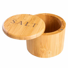 The "Salt" Engraved Salt Cellar by Totally Bamboo boasts a 6-oz. capacity and features a round bamboo design with a swiveling lid, engraved with the word "SALT." It includes a magnetic lock for secure closure, offering both style and functionality.