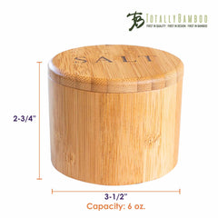 The "Salt" Engraved Salt Cellar from Totally Bamboo features a swiveling lid and measures 2-3/4 inches in height and 3-1/2 inches in diameter with a capacity of 6 ounces. It includes a magnetic lock for secure closure, and the top is engraved with "SALT.