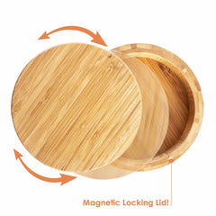 A round Moso bamboo container from Totally Bamboo, featuring a sliding lid that's slightly ajar to show its interior. Orange arrows emphasize the lid's magnetic locking mechanism, with "Magnetic Locking Lid!" text at the bottom right—perfect as a Barkeeper's Salt Box or Margarita Glass Rimmer.