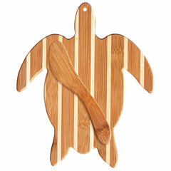 The Sea Turtle Serving Board with Spreader Knife Gift Set by Totally Bamboo is the perfect cheese serving set, featuring light and dark wood stripes and a matching wooden spatula on top.