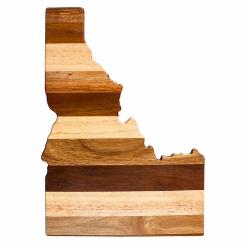 Totally Bamboo's Rock & Branch® Shiplap Series Idaho Cutting Board is designed in the shape of Idaho and showcases alternating horizontal stripes of light and dark wood tones.