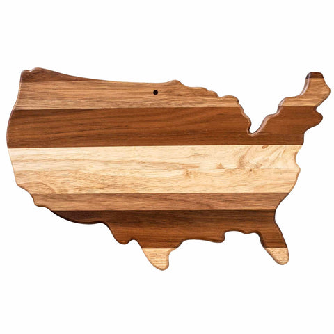 The Rock & Branch® Shiplap Series USA Cutting Board by Totally Bamboo is designed in the shape of the United States, featuring alternating light and dark wood stripes to achieve a shiplap look. Ideal for use as wall art or as a functional piece, it highlights American craftsmanship in every aspect.