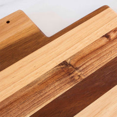 Close-up of a Rock & Branch® Shiplap Series Utah Cutting Board by Totally Bamboo, showcasing alternating light and dark wood grain stripes. The image emphasizes the textures and natural patterns of the planks.