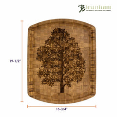 This Family Tree Etched Carving Board from Totally Bamboo features a charming tree design at its center and measures 19-1/2 inches by 15-3/4 inches. The board is stylishly branded with the "Totally Bamboo" logo in the top right corner, making it a perfect addition to any kitchen.