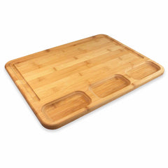 The 3-Well Kitchen Prep Board from Totally Bamboo, measuring 17-1/2" x 13-1/2", is a versatile rectangular cutting board with rounded corners, doubling as a charcuterie board. It includes three small, shallow compartments and boasts a smooth surface. The visible wood grain enhances its natural appearance, while an optional juice groove adds to its functionality.