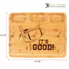 The "It's Good" 3-Well Kitchen Prep Board by Totally Bamboo delivers style with its football-themed rectangular bamboo design, ideal for tailgate snacks. It features three small compartments at the top for organization and a playful "IT'S GOOD!" detail. Measuring 17-1/2" by 13-1/2", this board includes a juice groove and bears the Totally Bamboo logo in the corner.