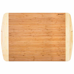 This Totally Bamboo 600SI Large Cutting Board & Noodle Board, measuring 30" x 20", is a rectangular wooden board with rounded corners and handle grooves on each side. It showcases a natural wood grain pattern and smooth surface, making it ideal for kitchen use. Additionally, it includes a built-in juice groove to efficiently gather liquids and prevent spills during chopping or slicing.