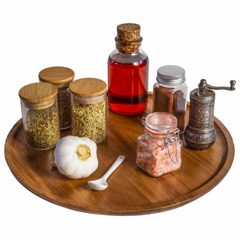 Photo of the TB Home Acacia Wood Lazy Susan with bottles of spices