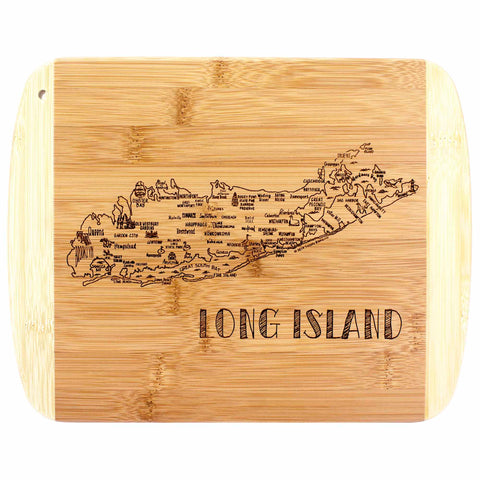 The A Slice of Life Long Island Cutting Board by Totally Bamboo, measuring 11" by 8-3/4", features a laser-engraved design highlighting Long Island. The map includes detailed town names and has "Long Island" prominently engraved at the bottom. Its rectangular shape with rounded edges adds a touch of elegance to your kitchen décor.