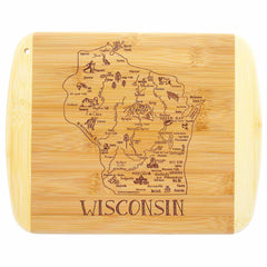 As part of the Slice of Life Collection by Totally Bamboo, the A Slice of Life Wisconsin Cutting Board, measuring 11" x 8-3/4", is crafted from bamboo and shaped like the state of Wisconsin. It features laser-engraved artwork that highlights illustrations and names of various cities and landmarks, with "WISCONSIN" elegantly engraved at the bottom.