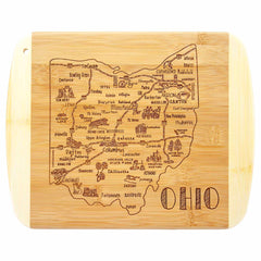 Introducing the "A Slice of Life Ohio Cutting Board" by Totally Bamboo, measuring 11" x 8-3/4". This charcuterie board features exquisite laser-engraved artwork of Ohio, showcasing cities like Columbus, Cleveland, and Cincinnati. It includes detailed illustrations of local icons such as trees and buildings, making it perfect for adding an artistic touch to your next gathering.