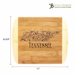 The A Slice of Life Tennessee Cutting Board by Totally Bamboo serves as a versatile charcuterie board, featuring laser-engraved artwork of the Tennessee map with city names. This rectangular bamboo board measures 11 inches by 8-3/4 inches and has rounded edges.