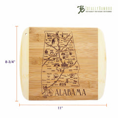 Check out the "A Slice of Life Alabama Cutting Board" by Totally Bamboo, featuring an Alabama-shaped bamboo design with engraved city and landmark details. This cutting board measures 11 inches by 8-3/4 inches and includes the "Totally Bamboo" logo in the top right corner.