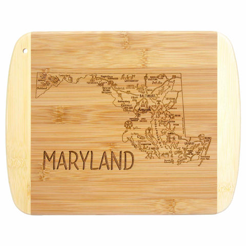 The Totally Bamboo "A Slice of Life Maryland Cutting Board," measuring 11" x 8-3/4", is beautifully engraved with the outline of Maryland, including city names like Baltimore and Annapolis, with "MARYLAND" elegantly inscribed underneath the map.