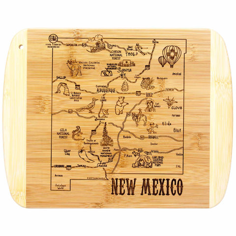 From the A Slice of Life Collection by Totally Bamboo, the A Slice of Life New Mexico Cutting Board (11" x 8-3/4") features a laser-engraved design of a stylized New Mexico map with landmarks, cities, and attractions such as hot air balloons and Carlsbad Caverns on its rectangular board with rounded edges and hanging hole.