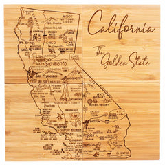 Introducing the 4-Piece California Puzzle Coaster Set with Case by Totally Bamboo: a wooden map intricately laser-engraved with city names, landmarks, and notable features like Yosemite Valley and Death Valley. The words "California" and "The Golden State" are prominently carved, adding a unique touch akin to an exquisite coaster or puzzle set.