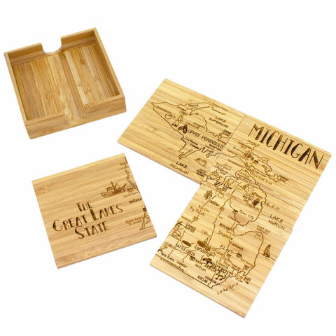 The "4-Piece Michigan Puzzle Coaster Set with Case" by Totally Bamboo offers a wooden puzzle set showcasing the map of Michigan, popularly known as "The Great Lakes State." These laser-engraved coasters highlight various cities, lakes, and landmarks throughout Michigan. The set includes intricately divided sections and comes complete with a storage box.