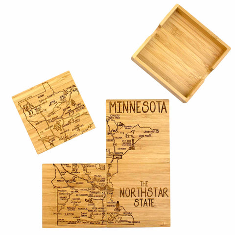 This 4-Piece Minnesota Puzzle Coaster Set with Case by Totally Bamboo is a distinctive wooden coaster collection that features a map of Minnesota. The set includes coasters and a box, both labeled "Minnesota" and "The North Star State," showcasing beautifully laser-engraved artwork of cities and lakes, making it an ideal gift for coaster lovers.