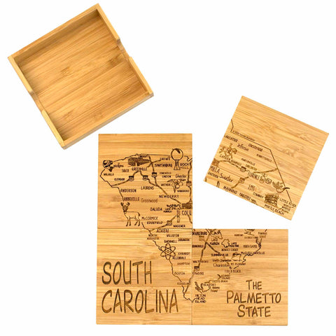 The 4-Piece South Carolina Puzzle Coaster Set with Case by Totally Bamboo makes for a distinctive gift and a sophisticated addition to any collection, showcasing wooden pieces that depict the state map of South Carolina with engraved city names and landmarks. The set also includes a laser-engraved coaster set neatly stored in an accompanying case, celebrating "The Palmetto State.