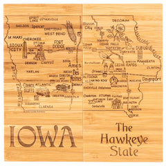 Discover a beautiful wooden cutting board etched with a detailed map of Iowa, highlighting cities such as Des Moines, Cedar Rapids, and Sioux City. This piece perfectly complements your Totally Bamboo 4-Piece Iowa Puzzle Coaster Set with Case. At the bottom, it proudly displays "IOWA" and "The Hawkeye State.