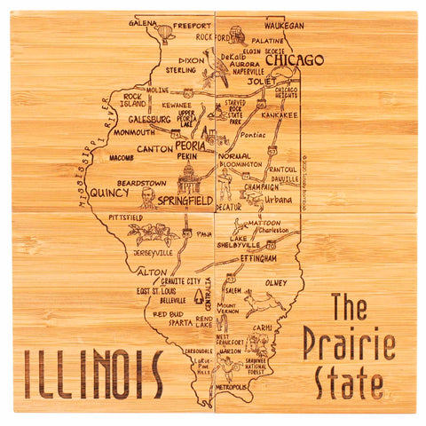 This laser-engraved artwork from Totally Bamboo features a wooden map of Illinois, highlighting cities and landmarks like Chicago, Springfield, and Peoria. With "Illinois" and "The Prairie State" prominently displayed, it’s perfect as a gift or as the 4-Piece Illinois Puzzle Coaster Set with Case.