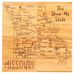 Introducing the 4-Piece Missouri Puzzle Coaster Set with Case from Totally Bamboo: a laser-engraved wooden map of "The Show-Me State" that doubles as an extraordinary coaster set. It beautifully showcases cities like Kansas City, St. Louis, and Springfield, along with notable landmarks and rivers intricately etched across Missouri.