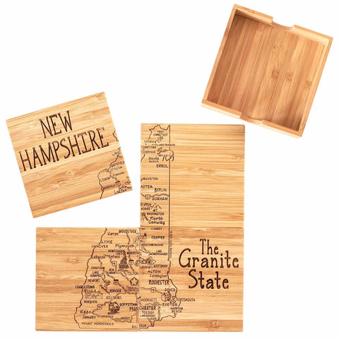 The 4-Piece New Hampshire Puzzle Coaster Set with Case by Totally Bamboo includes wooden coasters that are laser-engraved with a map of New Hampshire, featuring city names and the "The Granite State" text. This distinctive gift comes with a holder and a square coaster engraved with "New Hampshire," all crafted from bamboo, making it the ideal addition to any decor.