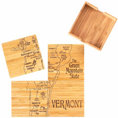 The 4-Piece Vermont Puzzle Coaster Set with Case by Totally Bamboo includes bamboo cutting boards engraved with maps of Vermont, showcasing cities such as Burlington and Montpelier. Additionally, it features a plain board and a square piece engraved with the state's nickname, "The Green Mountain State," making it a perfect addition to your decor.