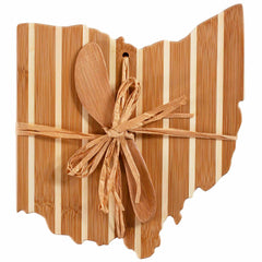 The Ohio Serving Board with Spreader Knife Gift Set by Totally Bamboo is a beautifully crafted wooden piece, showcasing elegant light and dark stripes. It comes with a bamboo spreading knife and is tied with a rustic ribbon, making it ideal for an exquisite charcuterie board presentation.