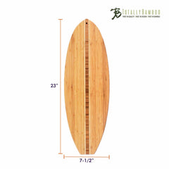 This Surfboard Shaped Cutting Board by Totally Bamboo measures 23 inches high and 7.5 inches wide, featuring a vertical stripe down the center. The "Totally Bamboo" logo is elegantly positioned in the top right corner, making it both a practical kitchen tool and an attractive wall decoration.