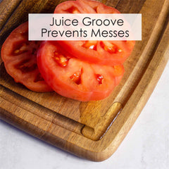 Slices of tomato are artfully arranged on the TB Home® Small Cutting Board with Juice Groove, 8" x 6", highlighting the acacia wood's natural elegance. The juice groove effectively wards off messes, keeping your prep area tidy and efficient. Text overlay reads, "Juice Groove Prevents Messes.