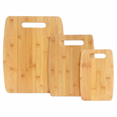 The Totally Bamboo 3-Piece Cutting Board Set includes three wooden boards of different sizes, each featuring a handle cutout at the top. The natural wood grain pattern adds aesthetic appeal to your kitchen while offering practical functionality.