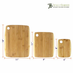 The 3-Piece 2-Tone Cutting Board Set by Totally Bamboo showcases three beautifully crafted cutting boards of varying sizes made from Moso bamboo, each featuring a natural wood finish. The set includes the largest board measuring 14"x11", a medium board at 11"x9", and the smallest at 8"x6", all proudly adorned with a logo in the top right corner.