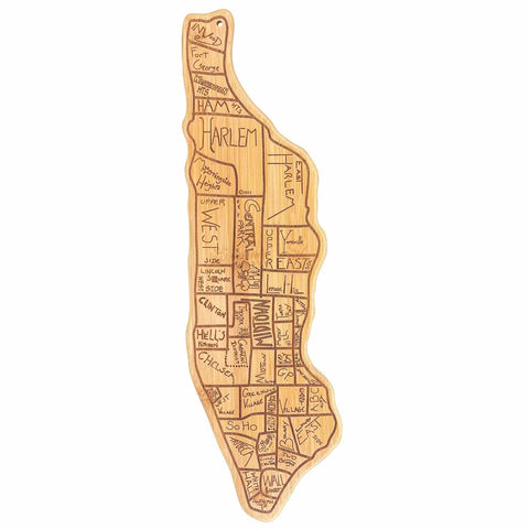 The City Life Manhattan Cutting Board by Totally Bamboo, measuring 7-1/4" x 22", is a wooden cutting board intricately crafted in the shape of Manhattan. It features beautifully laser-engraved artwork with neighborhood names such as Harlem, Greenwich Village, and SoHo, all artistically highlighted in a playful hand-drawn style.