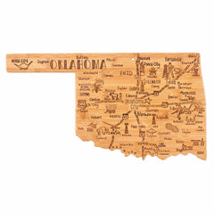 The Totally Bamboo Destination Oklahoma Cutting Board, measuring 16-3/4" x 9", is crafted from bamboo and features intricate laser-engraved artwork of the state's cities and landmarks in the shape of Oklahoma.