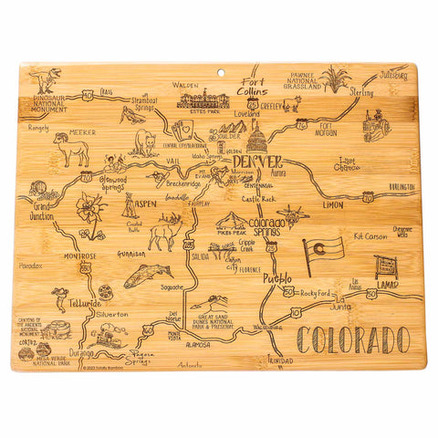 The "Destination Colorado Cutting Board" by Totally Bamboo, measuring 14-1/2" x 10-3/4", is a state-themed board that displays an illustrated map of Colorado on bamboo. It features cities such as Denver, Colorado Springs, and Aspen. The laser-engraved artwork includes landmarks, animals, and geographic features with playful drawings and intricate details.