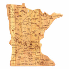 Explore the Destination Series with the Totally Bamboo Destination Minnesota Cutting Board, measuring 13-1/4" x 11-3/4". This bamboo board is intricately crafted in the shape of Minnesota and features engravings of city names, rivers, lakes, and landmarks. Cities like Minneapolis and Duluth are highlighted alongside charming illustrations of trees and fish.