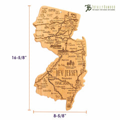 The Destination New Jersey Cutting Board by Totally Bamboo is a state-shaped piece crafted from bamboo, featuring laser-engraved city names and landmarks of New Jersey. It measures 8-5/8 inches wide and 16-5/8 inches high, with the Totally Bamboo logo displayed in the top right corner.