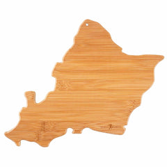 Introducing Totally Bamboo's Destination Oahu Cutting Board: a wooden cutting board shaped like the island of Oahu, featuring a smooth, bamboo cutting surface. The visible grain adds natural charm, while laser-engraved artwork enhances its appeal. A small hole at the top makes it perfect for hanging and display.