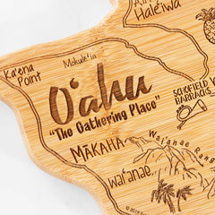 As part of the Destination Series, the Totally Bamboo Destination Oahu Cutting Board (14" x 11") showcases laser-engraved artwork featuring detailed locations such as Ka'ena Point and Hale'iwa. Decorated with illustrations of a pineapple, a trumpet, and palm trees, it embodies the spirit of "O'ahu, The Gathering Place.