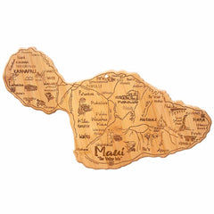 The Totally Bamboo Destination Maui Cutting Board, measuring 15-1/2" x 9-1/8", showcases intricate laser-engraved artwork that labels regions such as Lahaina, Hana, and Haleakala. Adorned with illustrations of palm trees, a whale, and traditional Hawaiian symbols, this piece serves as both a decorative and enchanting item.