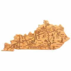 The Totally Bamboo Destination Kentucky Cutting Board, measuring 18" x 8-1/2", is intricately shaped like the state of Kentucky. It showcases engraved illustrations and names of cities and landmarks such as Louisville, Lexington, and Bowling Green, making it an ideal choice for either a distinctive bamboo cutting surface or enchanting wall art.